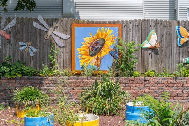 Lauer's Park Elementary students maintain a community garden in Sixth Ward.