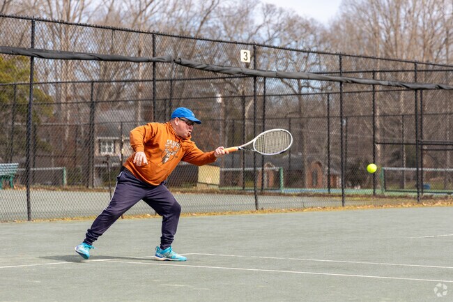 Folks love playing a game of tennis at Forest Oaks Country Club.