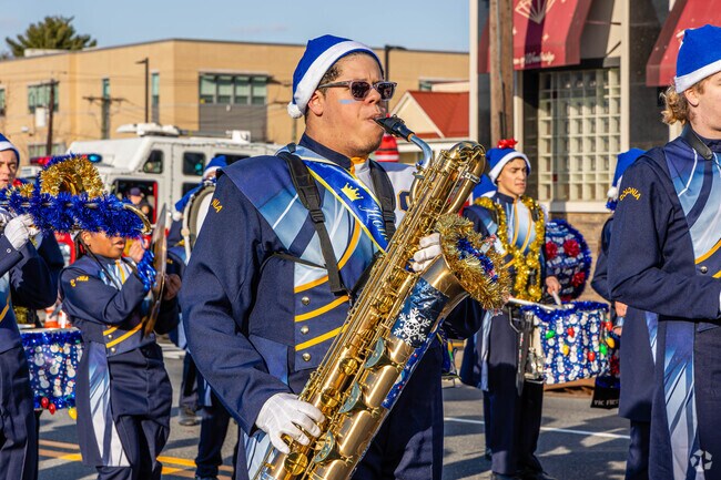 The Colonia marching band rehearsed for hours to perform in the Woodbridge Holiday Parade.