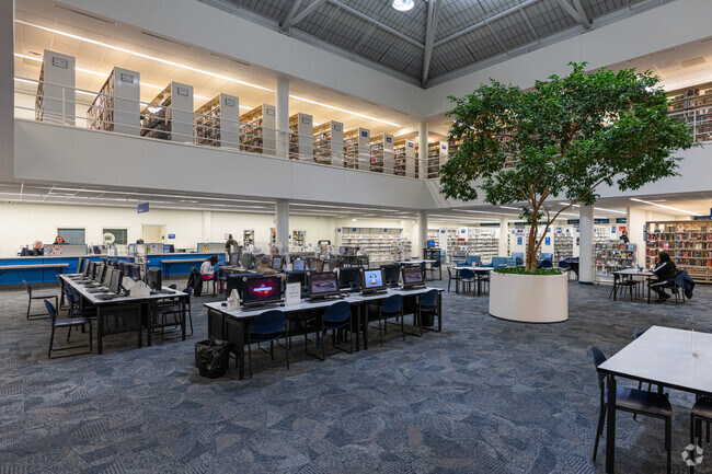 Residents borrow books at the Merrillville Branch of the Lake County Public Library.
