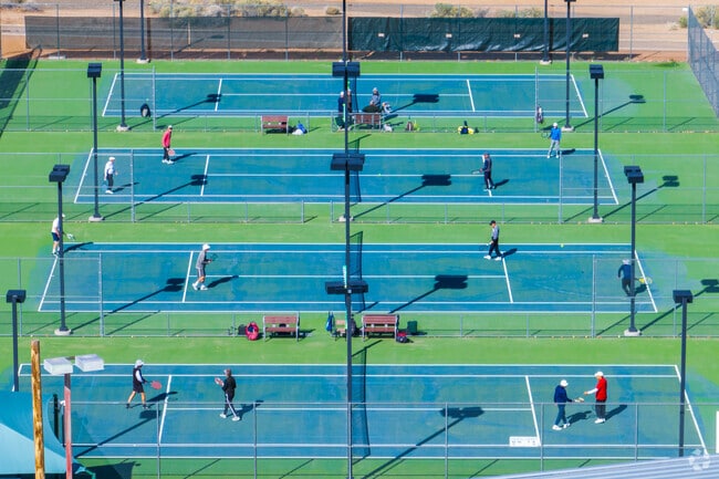Friends gather for a beautiful day of tennis at Jerry Cline Tennis Center.