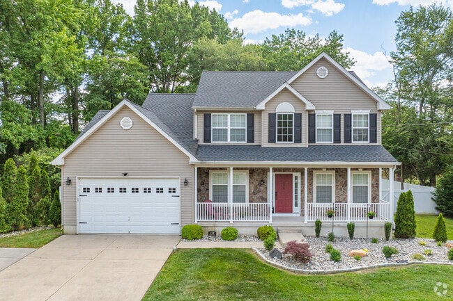 Traditional single family homes in Penns Grove typically have large front porches and yards.