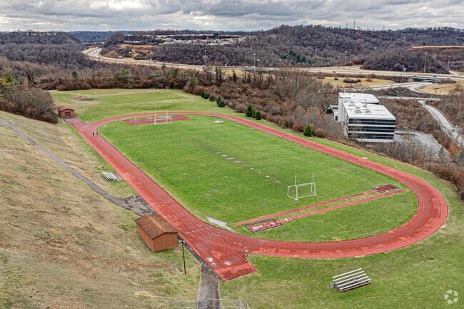 Carlynton Junior/Senior High School has a football field with a running track going around it.