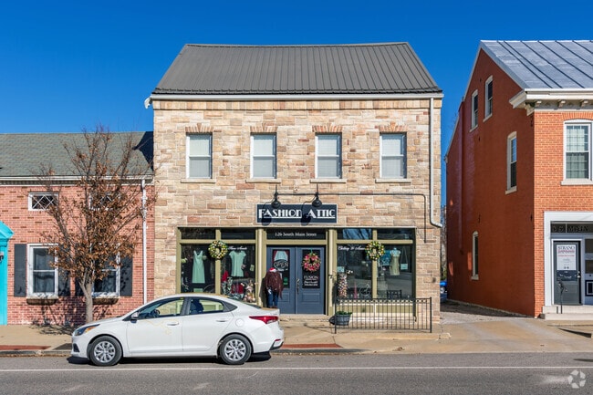 Shop for clothes at Fashion Attic on the main downtown strip in Columbia.