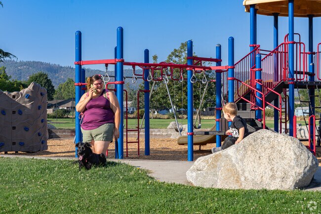 A West Main mother enjoys bringing her son and dog to one of the clean and safe parks.