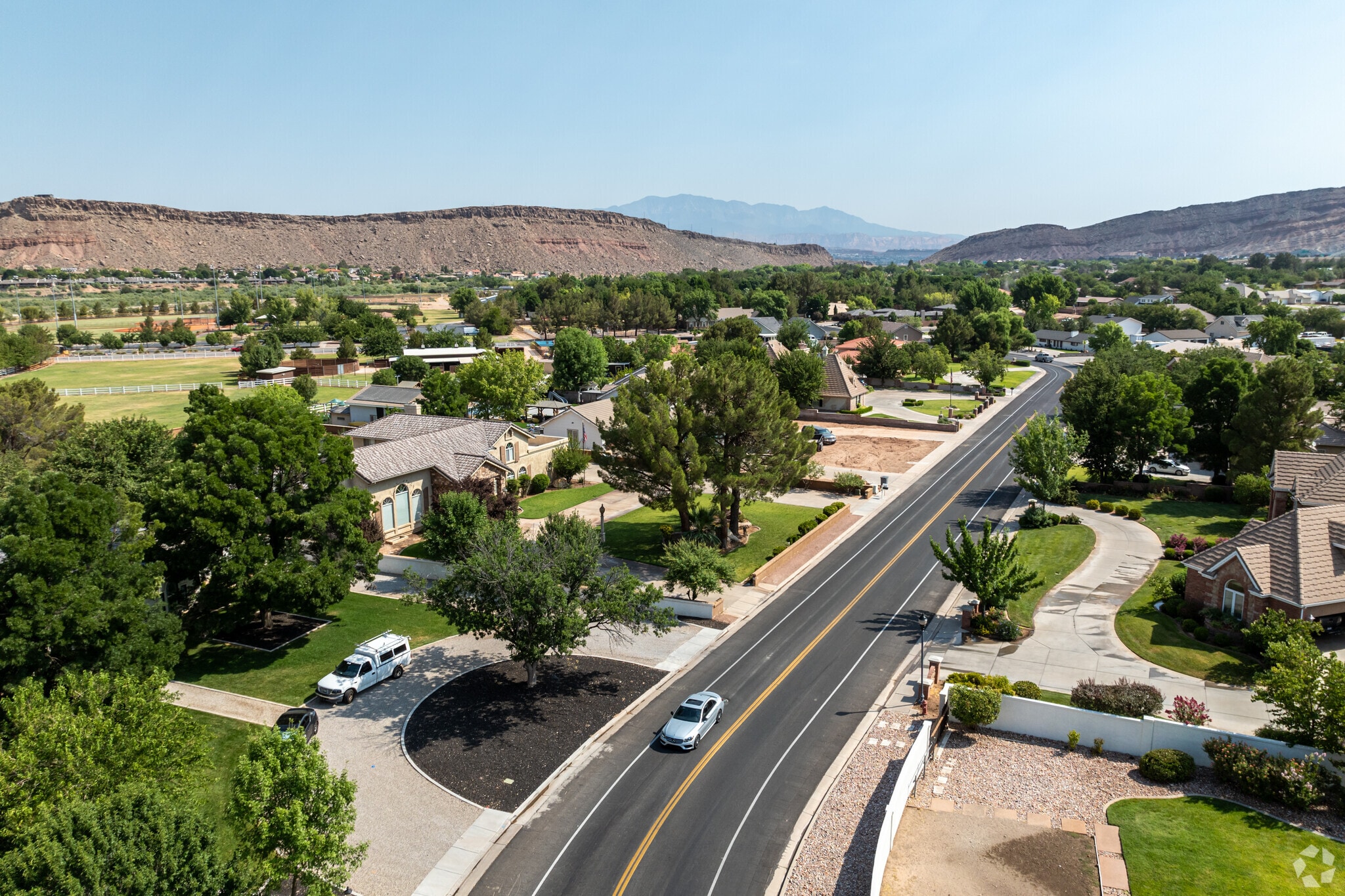 Large estates with mature trees are common in the Bloomington Ranches neighborhood.