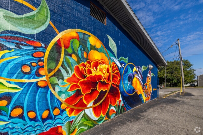 A bright, colorful mural on display in the Thomas Park - Avondale neighborhood.