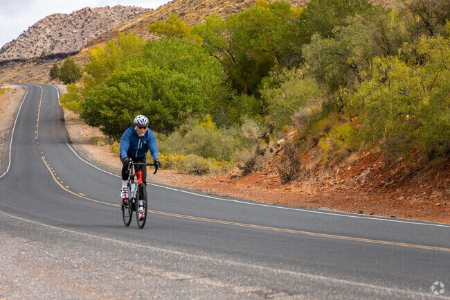 Bikers are seen in and through Brookside.