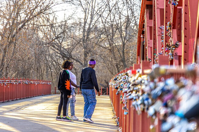 Visit the iconic Old Red Bridge near Calico Farms, famous for its love-lock tradition.