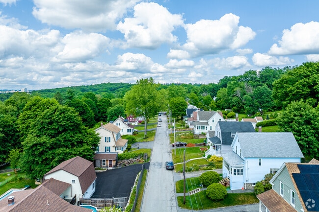 Cape Cod, Conventional, and Bungalows line Field Street in Pakachoag.