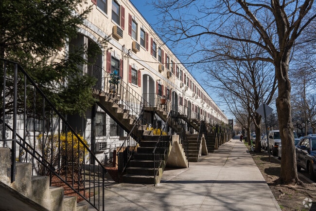 Greek Revival rowhomes in Soundview combine classic elegance with modern comfort.