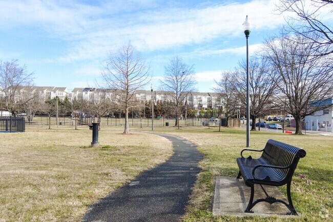 Sit and relax on one of the benches along the walking path at Dakota Park in Gateway.