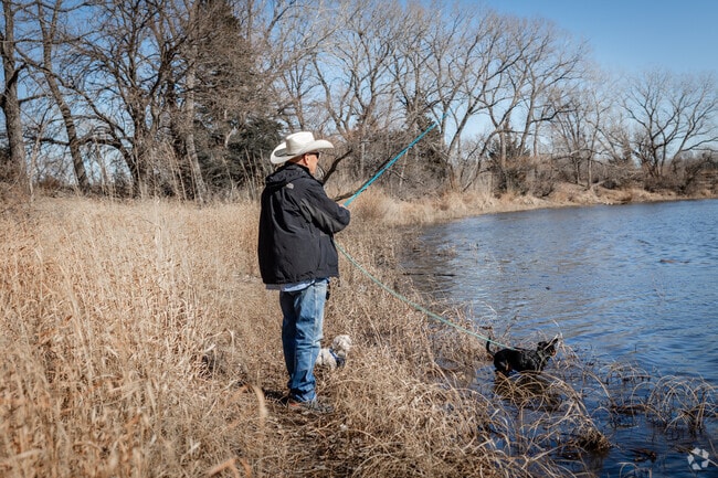 Enjoy some fishing at the lake in Sedgwick County Park by Orchard Park.