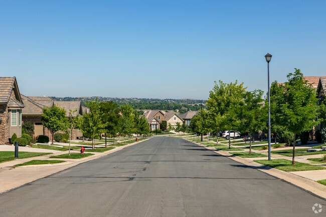 The HOA mows your lawn & waters your grass in the winter in the Country Club Highlands.
