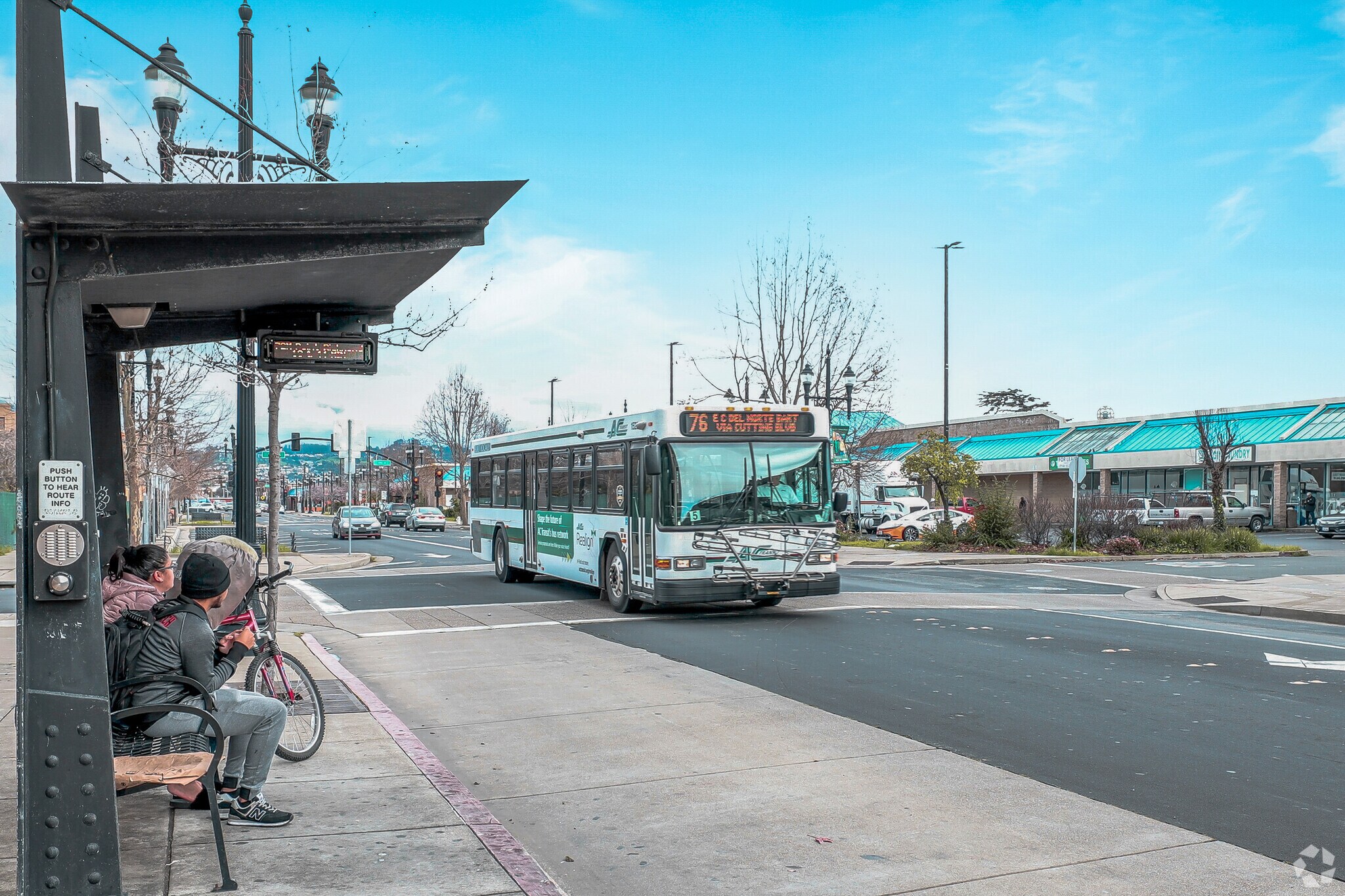 Transit Stop as people are waiting for Bus in Richmond’s Iron Triangle Neighborhood.
