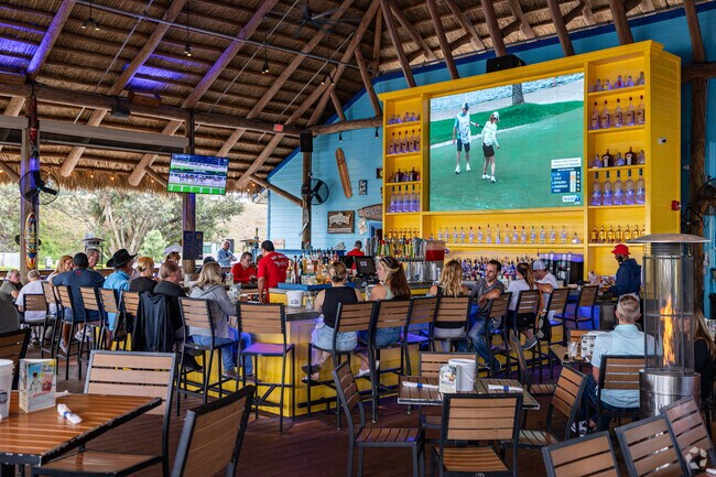 The Boathouse is known for its seafood, bar, and large tiki hut in Fort Myers Shores.