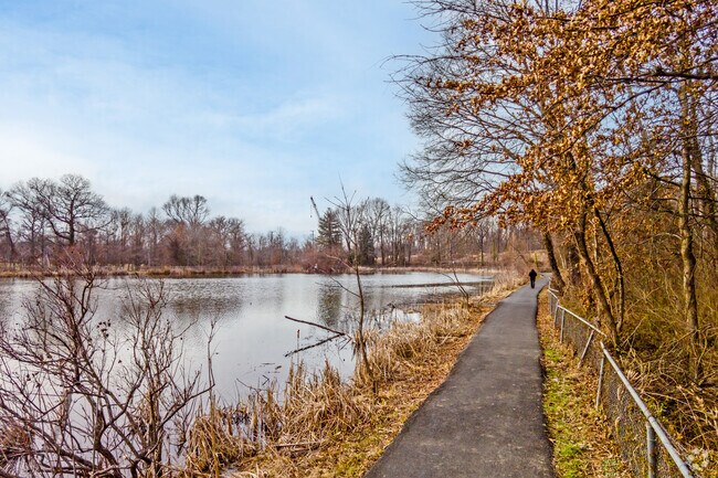 Residents enjoy scenic walks by the water at University Hills Duck Pond near Lewisdale.