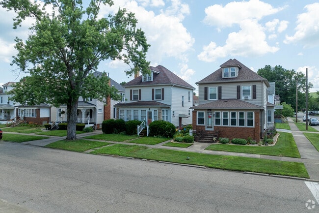 Four Square homes with enclosed porches in Uhrichsville, Ohio.