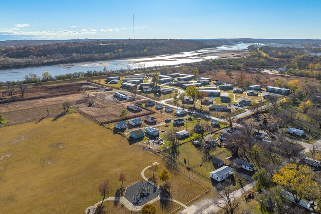 The Arkansas river runs a mile to the South of Bruner.