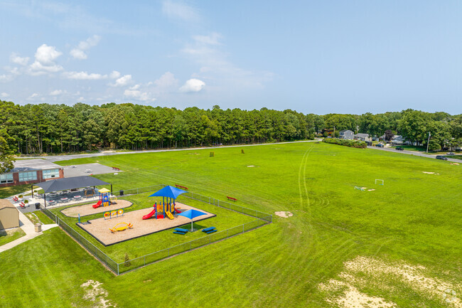 Large sprawling fields surrounds Emma C. Attales Middle School.