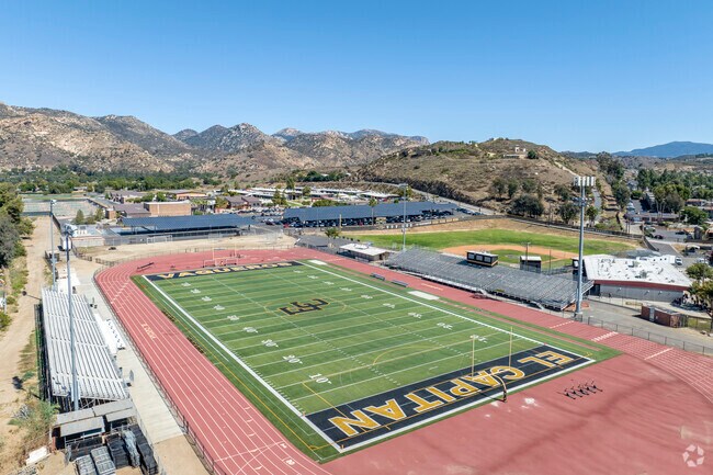 The El Capitan High School in Lakeview with the mountains in the background.