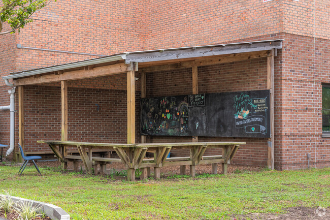 An outdoor chalkboard is a unique feature in the Julian Mitchell Elementary School's courtyard.