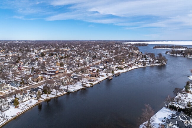 Homes in Menasha line the shore of the Menasha Channel which leads out to Lake Winnebago.