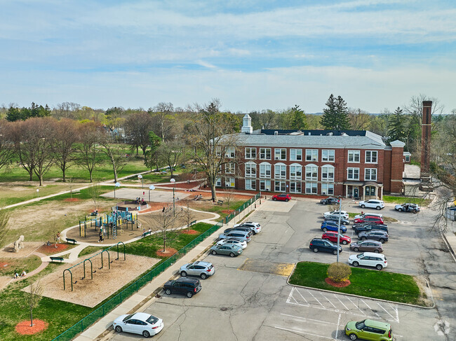 Burns Park Elementary has a large side lot and playground.