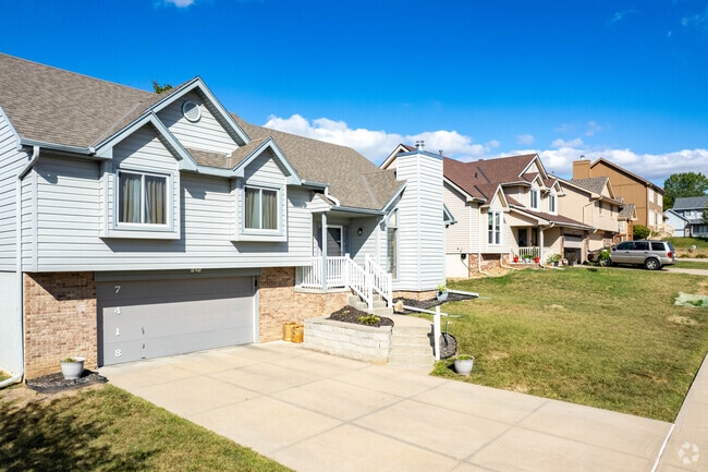 Many homes in the Wood Bridge neighborhood have two-car garages.