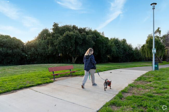 Your dog will love taking a walk through Oak Meadow Park.