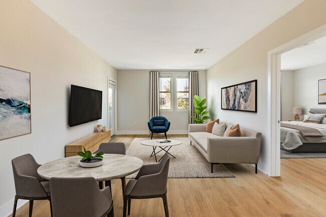 Renovated Package I dining and living room with hard surface flooring