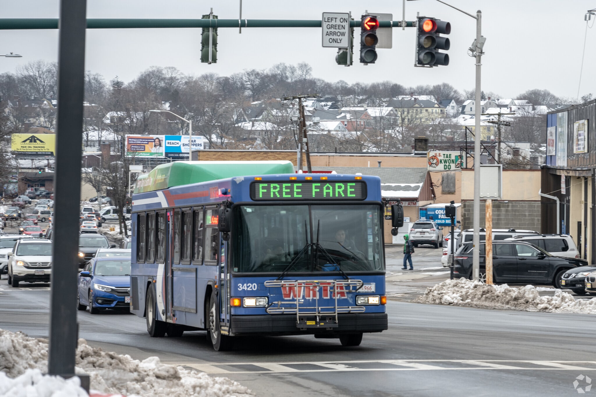 This Worcester City bus is traveling through Webster Square.
