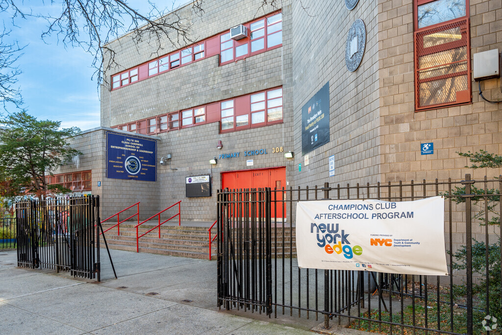 Entrance to PS 308 Clara Cardwell is located along Quicy St.