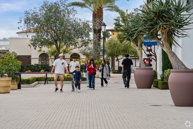 Visitors enjoy retail therapy at The Veranda near Princess Park.