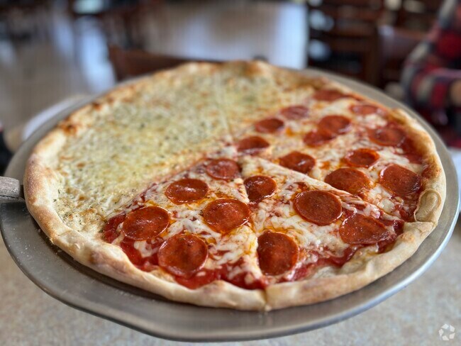 Grab a few slices from Village Pizza and Subs in Linglestown.