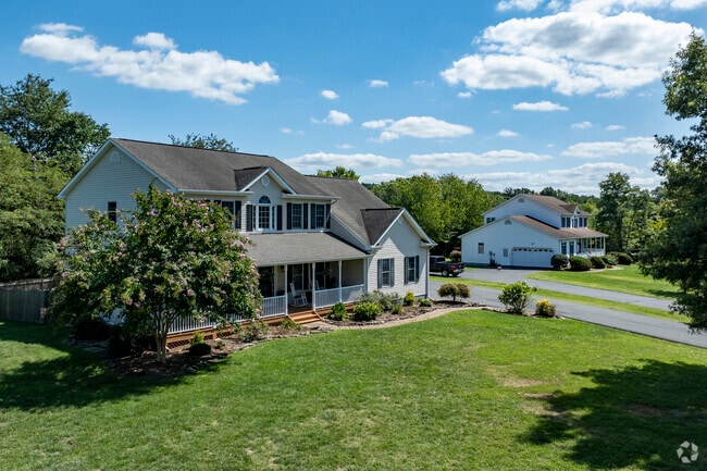 Large single family homes line the streets in areas of New Baltimore.