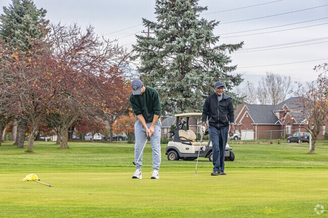 Grab your clubs and a friend and hit the links at Woodside Meadows in Brownstone Charter.