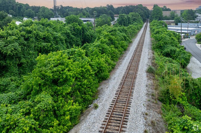 The railroad tracks mark the southern border of the Woodland Hills neighborhood.