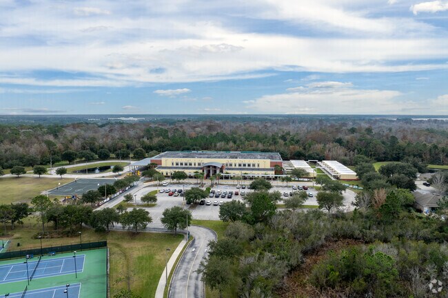 Mature trees provide prviacy in all directions for Moss Park Elementary School.