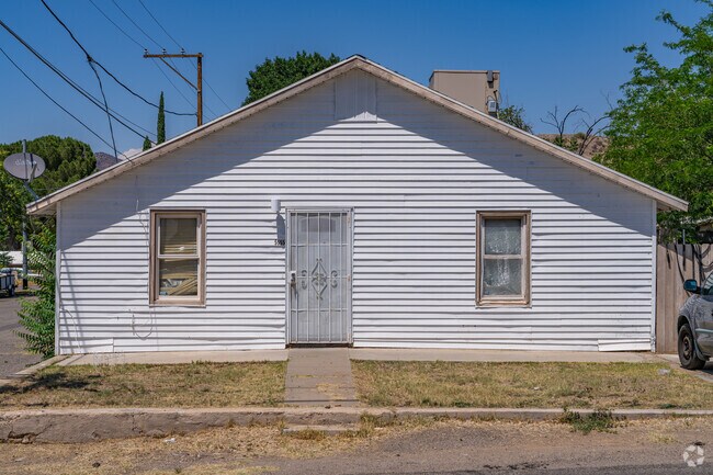 Traditional wood-frame cottages, often with front-facing gables and narrow footprints, are common in Central Heights-Midland City.
