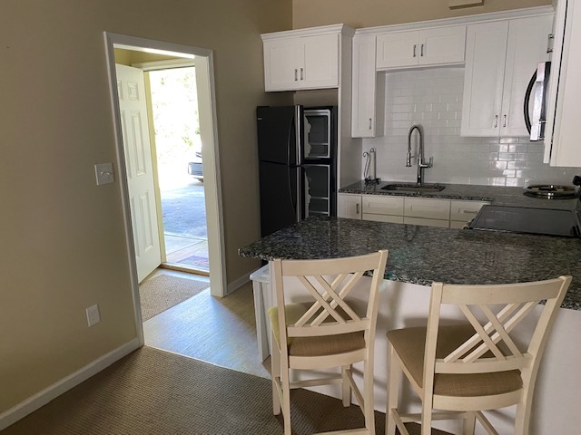 Kitchen looking out front door