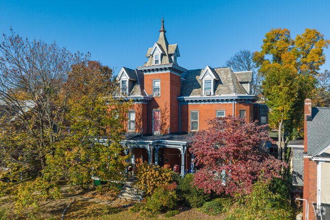 Victorian-style home in Cool Spring-Tilton Park with dormer windows and wide porch.