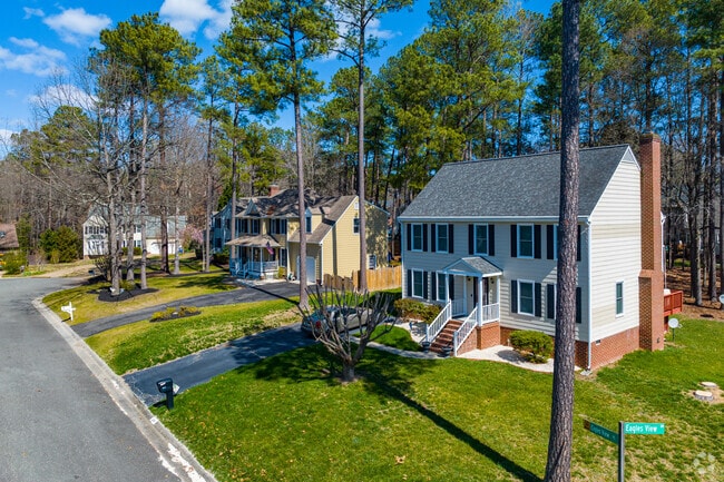 Colonial Revival homes line the streets of John Rolfe.