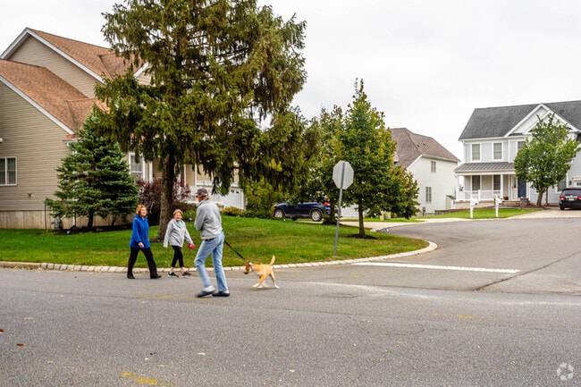 Neighbors out for a midday stroll in Pine Beach.