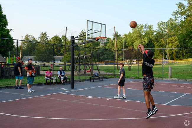 Ellenville locals come to Berme Road Park to shoot hoops.