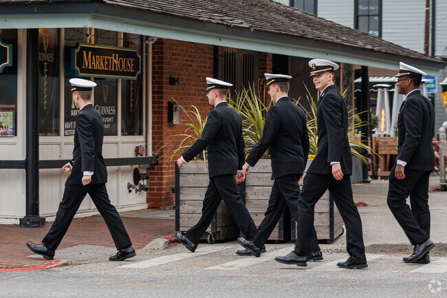 Uniformed midshipmen head to dinner in Downtown Annapolis.