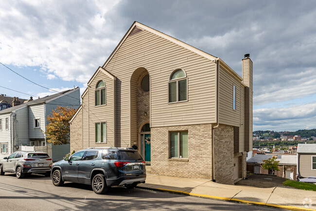 Find a home with a view of the big city in South Side Slopes.