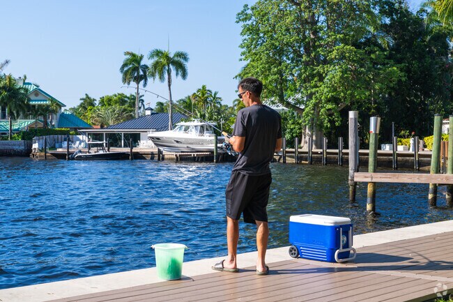 Go fishing at the peaceful Lewis Landing Park by Tarpon River.