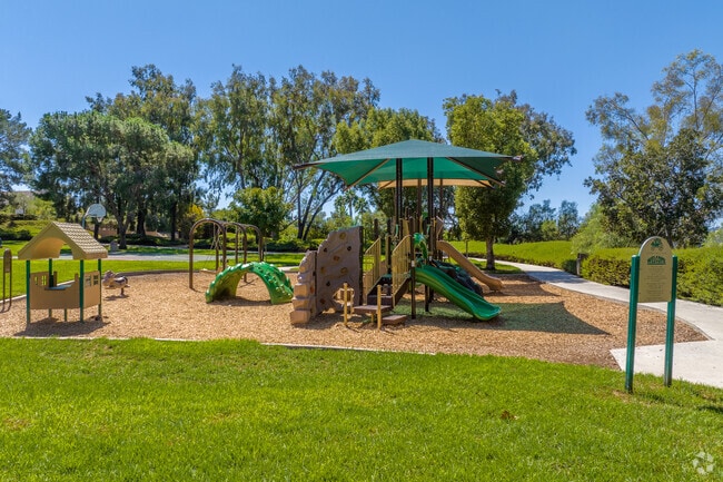 Hidden Trail Park has a playground for kids to explore.