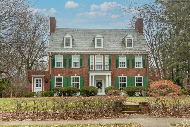 Colonial brick homes look so cozy within the neighborhood of West Bluff.